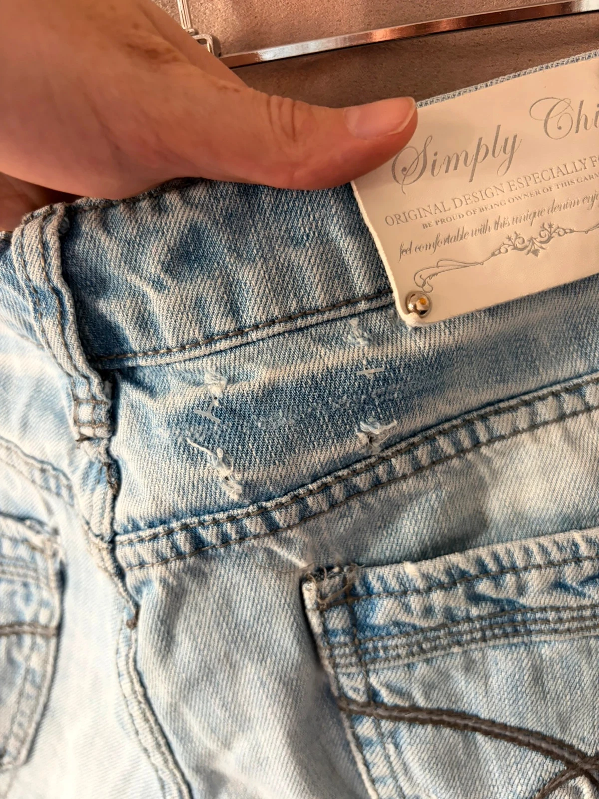 Pantalón corto con agujeros efecto desgastado talla 38 – photo 4